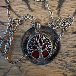 Sterling Silver Tree of Life Pendant Necklace with beautiful amber inlay .
